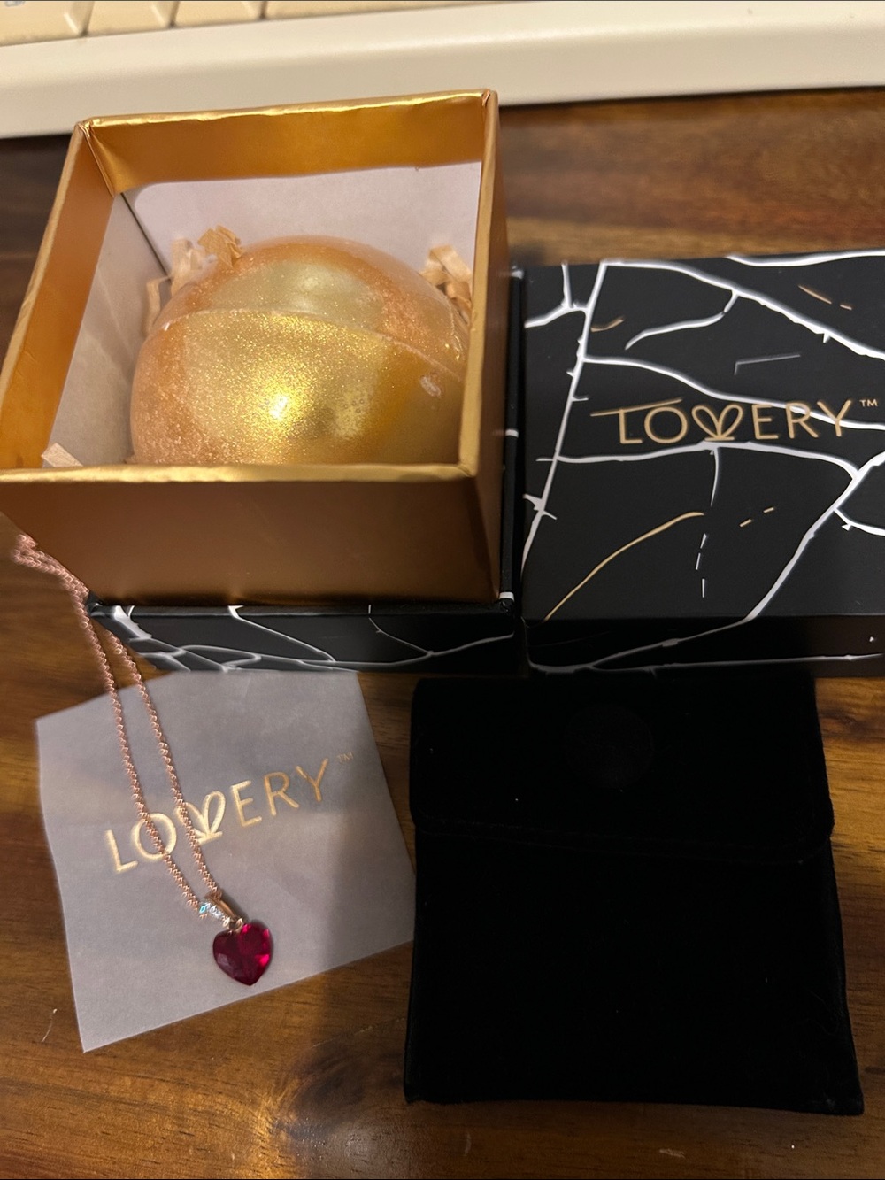 Rose Gold Necklace with Red Heart Pendant and bath bomb